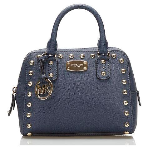 michael kors precio usa|Michael Kors latest.